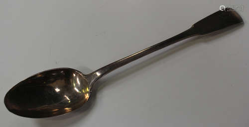 A late 18th/early 19th century French silver Fiddle pattern serving spoon, length 31cm.Buyer’s