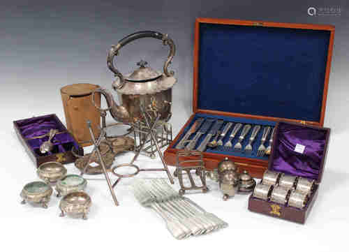 A collection of plated items, including a kettle on stand, a set of six napkin rings, cased, a