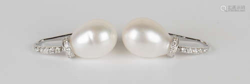 A pair of 18ct white gold, cultured pearl and diamond pendant earrings, each cultured pearl