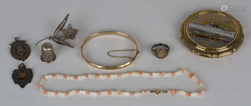 A group of mostly silver costume jewellery, comprising a gilt oval signet ring, a niello decorated