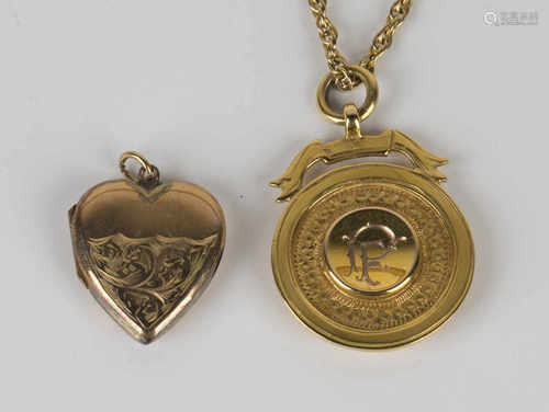 A 9ct gold pendant fob medallion, presentation inscribed, Birmingham 1928, with a 9ct gold