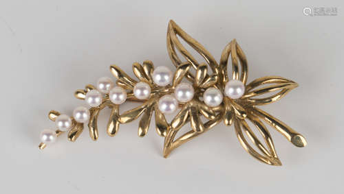 A 9ct gold and cultured pearl brooch, designed as a foliate spray, with a case.Buyer’s Premium 29.4%