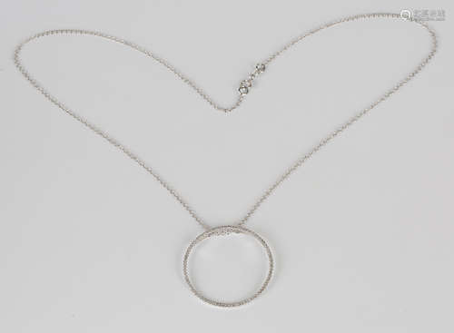 A 9ct white gold and diamond pendant of circlet form, detailed '9k 375', diameter 3cm, on a 9ct