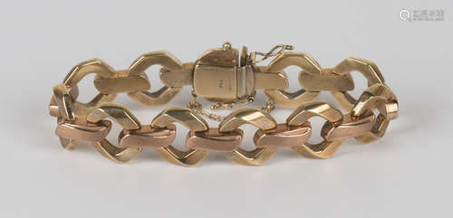 A 9ct two-colour gold bracelet in a faceted oval and textured bar link design, on a snap clasp