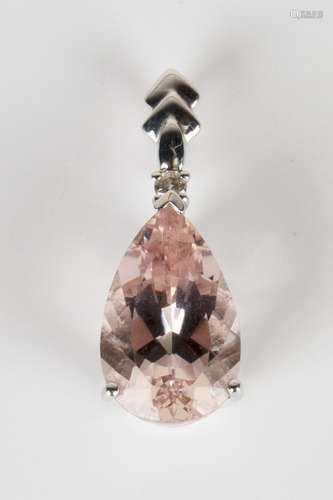 A 9ct white gold, morganite and diamond pendant, claw set with a pear shaped morganite with a