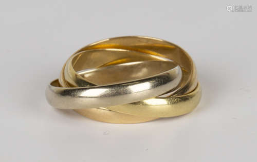 A Must de Cartier three colour gold triple band Russian style wedding ring, detailed to one band '