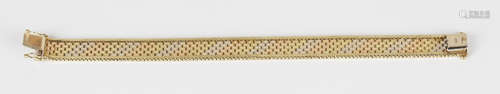 A 9ct three colour gold bracelet in a multiple row design with a textured finish between herringbone