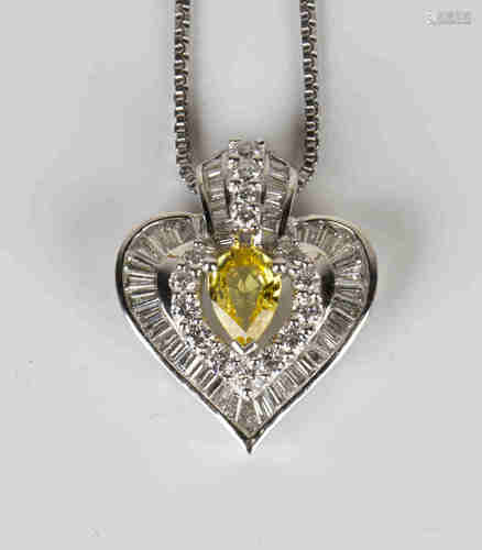 A white gold, diamond and yellow gem set stylized heart shaped pendant, mounted with a pear shaped