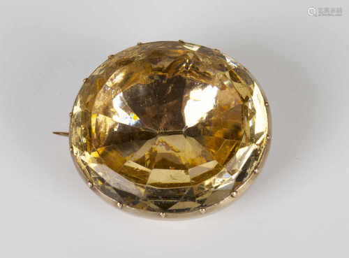 A gold mounted foil backed faceted yellow paste set brooch, circa 1820, width 3.4cm.Buyer’s