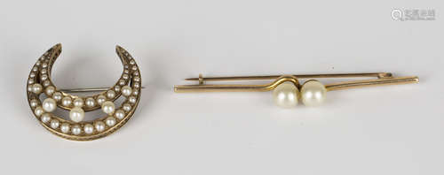 A gold and seed pearl set brooch, circa 1900, designed as a crescent, length 2.8cm, and a gold bar