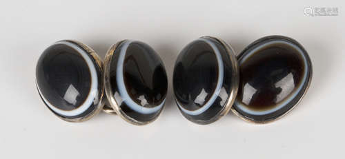 A pair of silver and banded agate set cufflinks, each front and back mounted with an oval banded