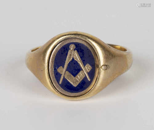 A 9ct gold and blue enamelled signet ring, the oval centre rotating to show Masonic square and