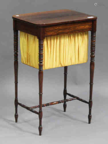A Regency rosewood work table, the rectangular top above a sliding basket, raised on slender