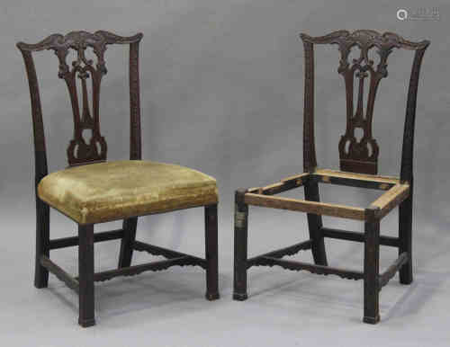 A pair of George III Chippendale period mahogany dining chairs with carved decoration, the pierced