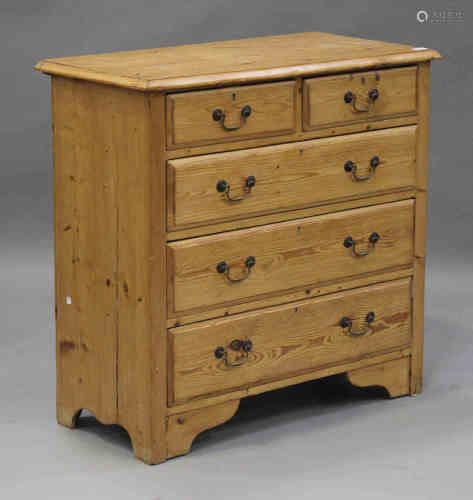 A 20th century pine chest of two short and three long drawers, on bracket feet, height 95cm, width