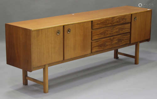 A mid-20th century McIntosh & Co teak sideboard, fitted with drawers and cupboards, on block legs,