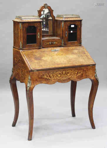 A mid-Victorian burr walnut lady's bonheur-du-jour with gilt metal mounts and boxwood inlaid