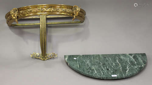 An early 20th century Neoclassical Revival gilt metal demi-lune console table with green marble top,
