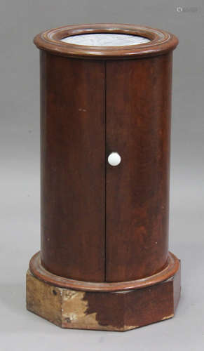 A Victorian mahogany cylinder pot cupboard, the inset marble top above a cupboard, on a plinth base,