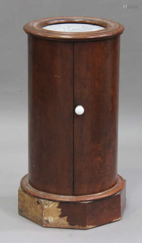 A Victorian mahogany cylinder pot cupboard, the inset marble top above a cupboard, on a plinth base,
