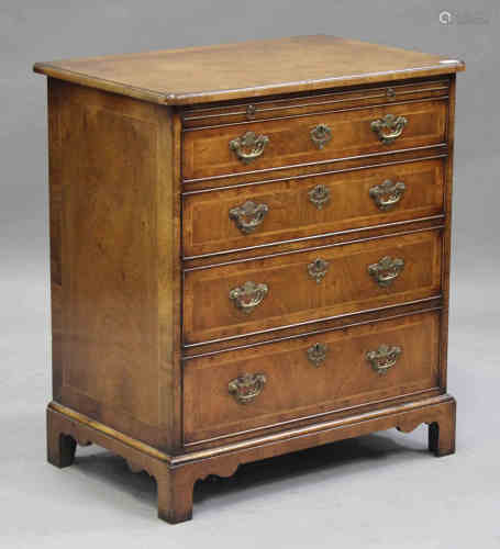 A late 20th century George I style walnut bachelor's chest by Titchmarsh & Goodwin, the feather