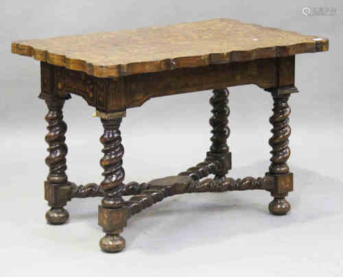 A late 18th/early 19th century Dutch marquetry centre table, profusely inlaid with flowers, the