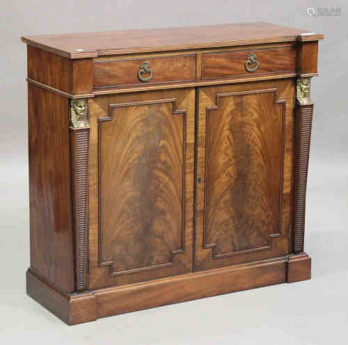 A Regency figured mahogany inverted breakfront side cabinet with Egyptianesque gilt metal mounts,