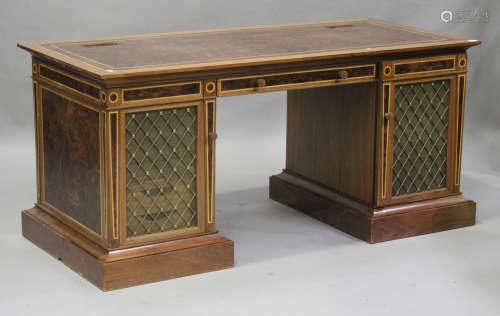 A late 20th century David Linley burr walnut and ash twin pedestal desk with line inlaid decoration,