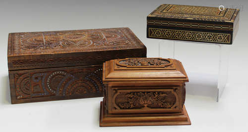 A late 19th/early 20th century Continental carved satin walnut jewellery casket, width 13.5cm,