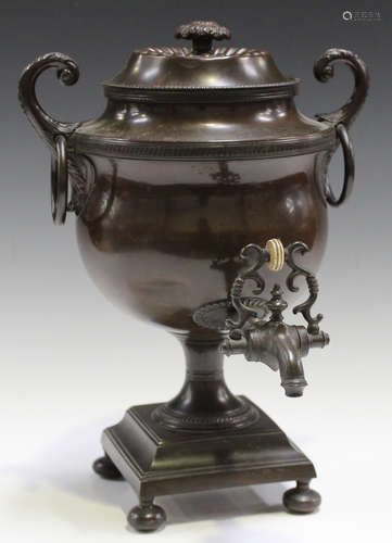 An early 19th century patinated bronzed copper samovar of classical urn form, fitted with ring