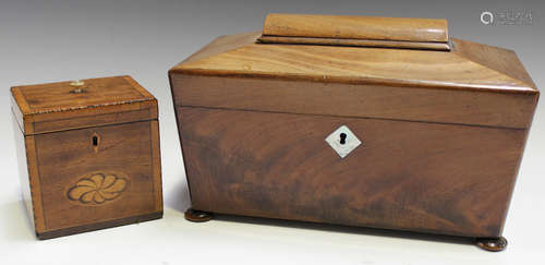 A small George III mahogany and crossbanded tea caddy, the front inlaid with a flowerhead patera,