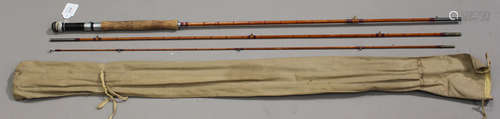 A group of four fishing rods, including a Redpath & Co split cane three-piece rod.Buyer’s Premium