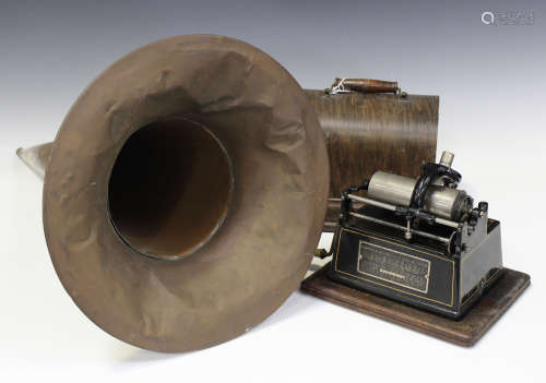 An Edison Gem phonograph, serial number 'G141112', within its oak case, width 25cm, together with