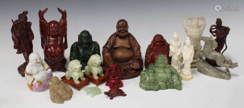 A collection of late 20th century Eastern carved Buddhas and other figures.Buyer’s Premium 29.4% (