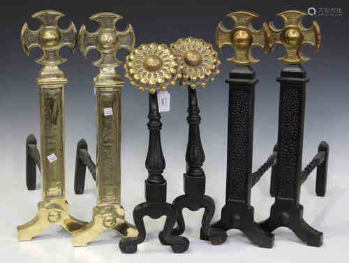 A pair of modern cast iron and brass mounted andirons with sunflower finials, height 48cm,