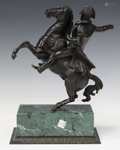 A late 19th/early 20th century black patinated cast bronze equestrian figure of Napoleon Bonaparte