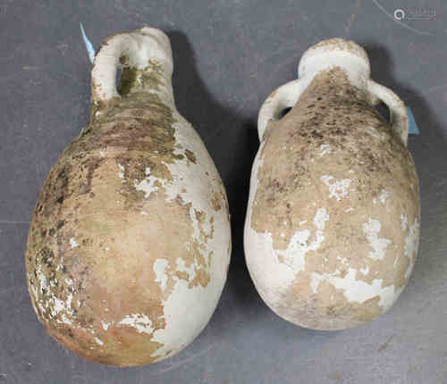 Two Mediterranean earthenware amphora type oil jars, lengths 56cm and 47cm.Buyer’s Premium 29.4% (