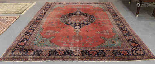 A Sparta carpet, West Anatolia, early 20th century, the terracotta field with a large shaped