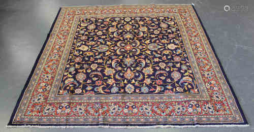 An Arak square rug, North-west Persia, mid/late 20th century, the midnight blue field with overall