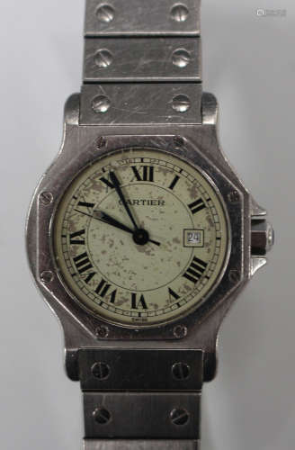 A Cartier steel cased automatic wristwatch, the signed cream coloured dial with date-of-the-month
