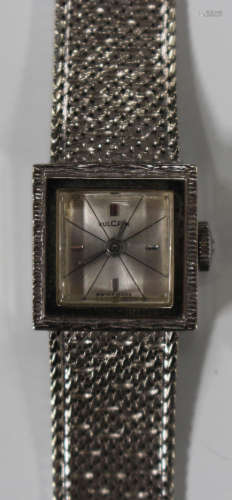 A Vulcain white gold lady's bracelet wristwatch, the signed square dial with baton hour markers at
