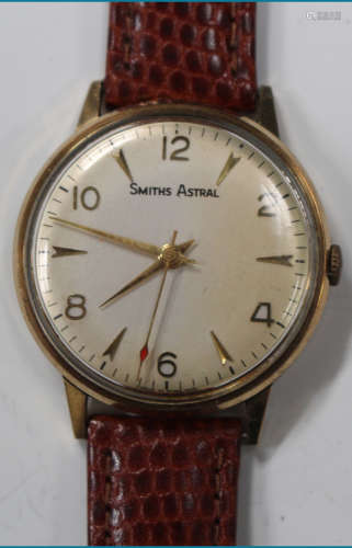 A Smiths Astral 9ct gold cased gentleman's wristwatch, the jewelled movement detailed '121' over '