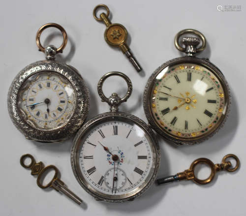 A silver cased keyless wind open-faced lady's fob watch with a gilt cylinder movement, the inner and