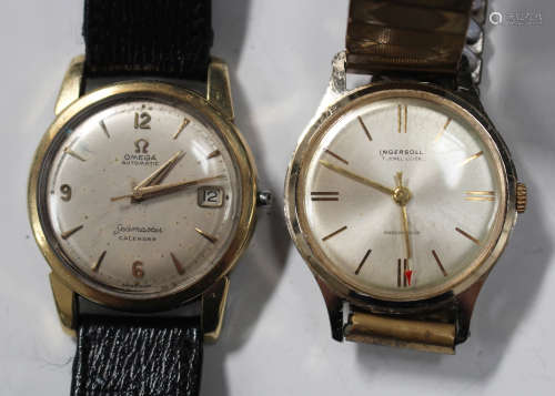 An Omega Automatic Seamaster Calendar gilt metal fronted and steel backed gentleman's wristwatch,