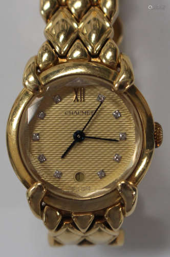A Chaumet Paris 18ct gold and diamond set lady's bracelet wristwatch, the signed textured gilt