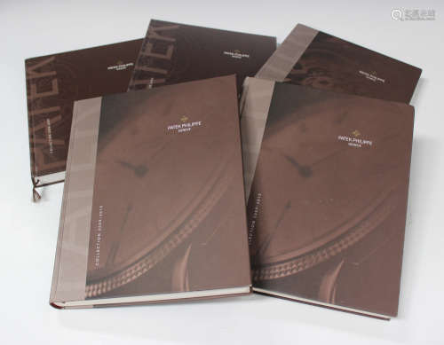 A collection of Rolex, IWC, Patek Phillipe, Breguet and A. Lange & Söhne collection catalogues,