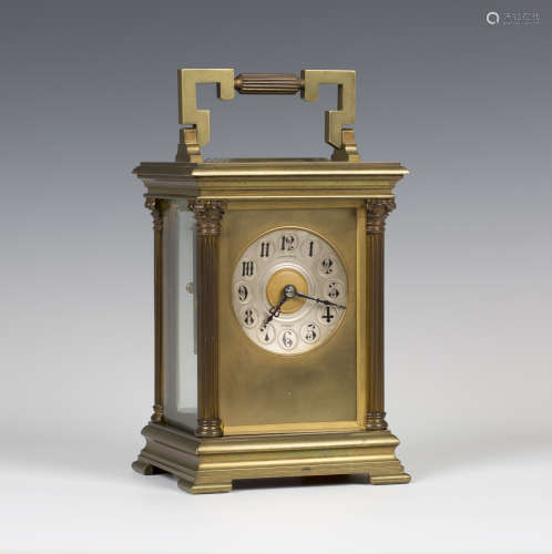An early 20th century French brass cased oversized carriage clock with eight day movement striking