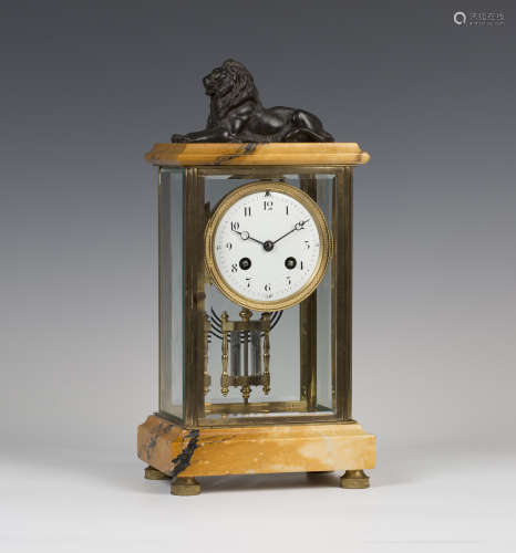 A late 19th century French lacquered brass and Sienna marble four glass mantel clock, the eight