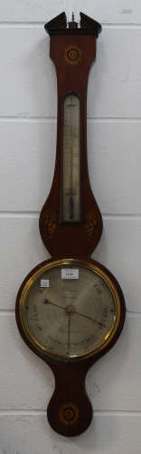 A George III mahogany wheel barometer with alcohol thermometer and silvered dials inscribed 'C.