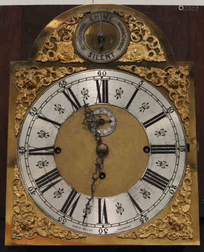 An Edwardian inlaid mahogany longcase clock with eight day movement chiming on eight bells and